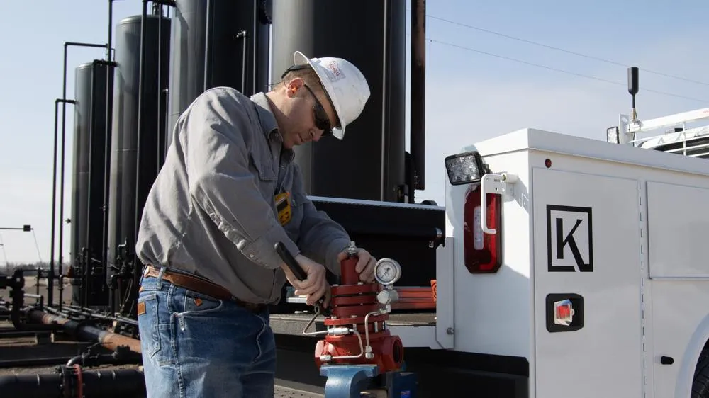 Kimray Technician Working on a Valve