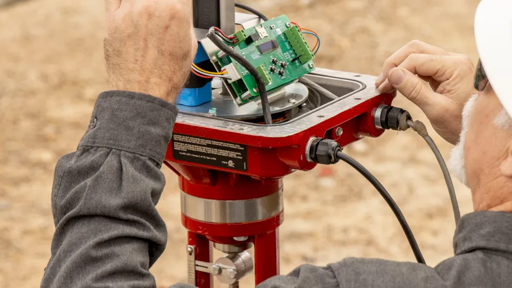 Kimray Team Member Working on an Electric Actuator