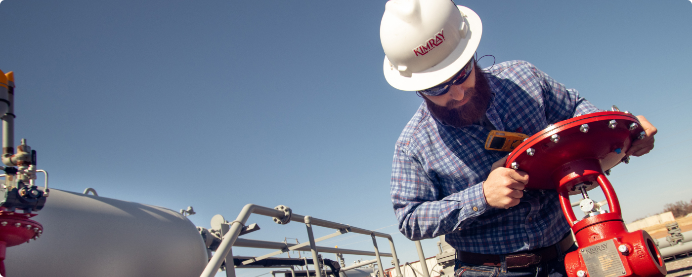 Kimray Team Member with a T-Body High Pressure Control Valve