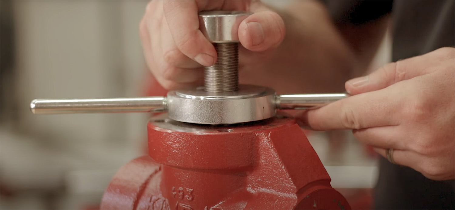 Technician Using Seat Removal Tool