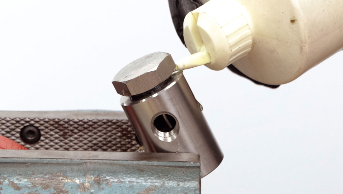 add oil to the filter cap