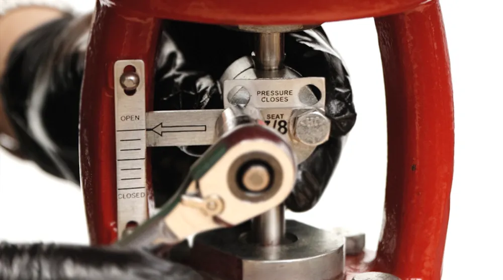 change indicator plate to show pressure closes