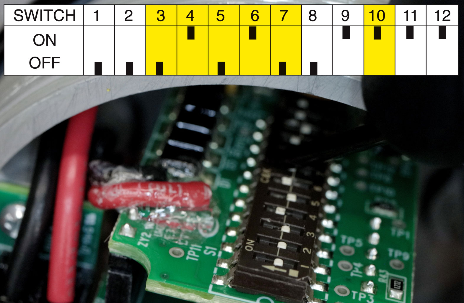 photo of dip switches and a chart showing which switches to position for reverse acting